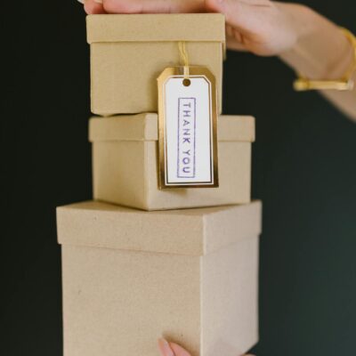 Person Holding Brown Wooden Box